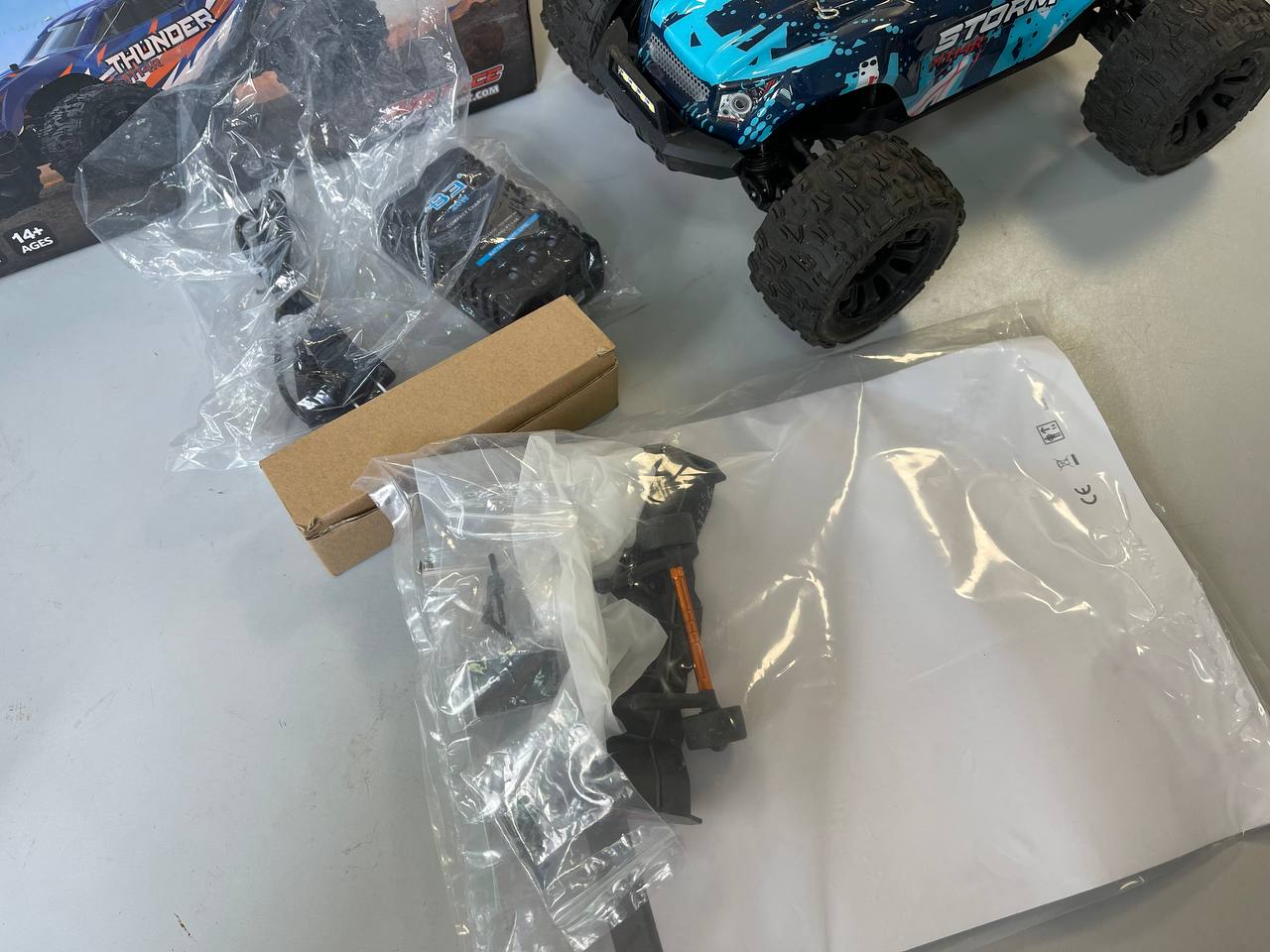 Радиоуправляемый автомобиль JIUSI PT14R MT14R 1/14 4WD (2 аккумулятора) (80 км/ч, бесколлекторные моторы) Б/У