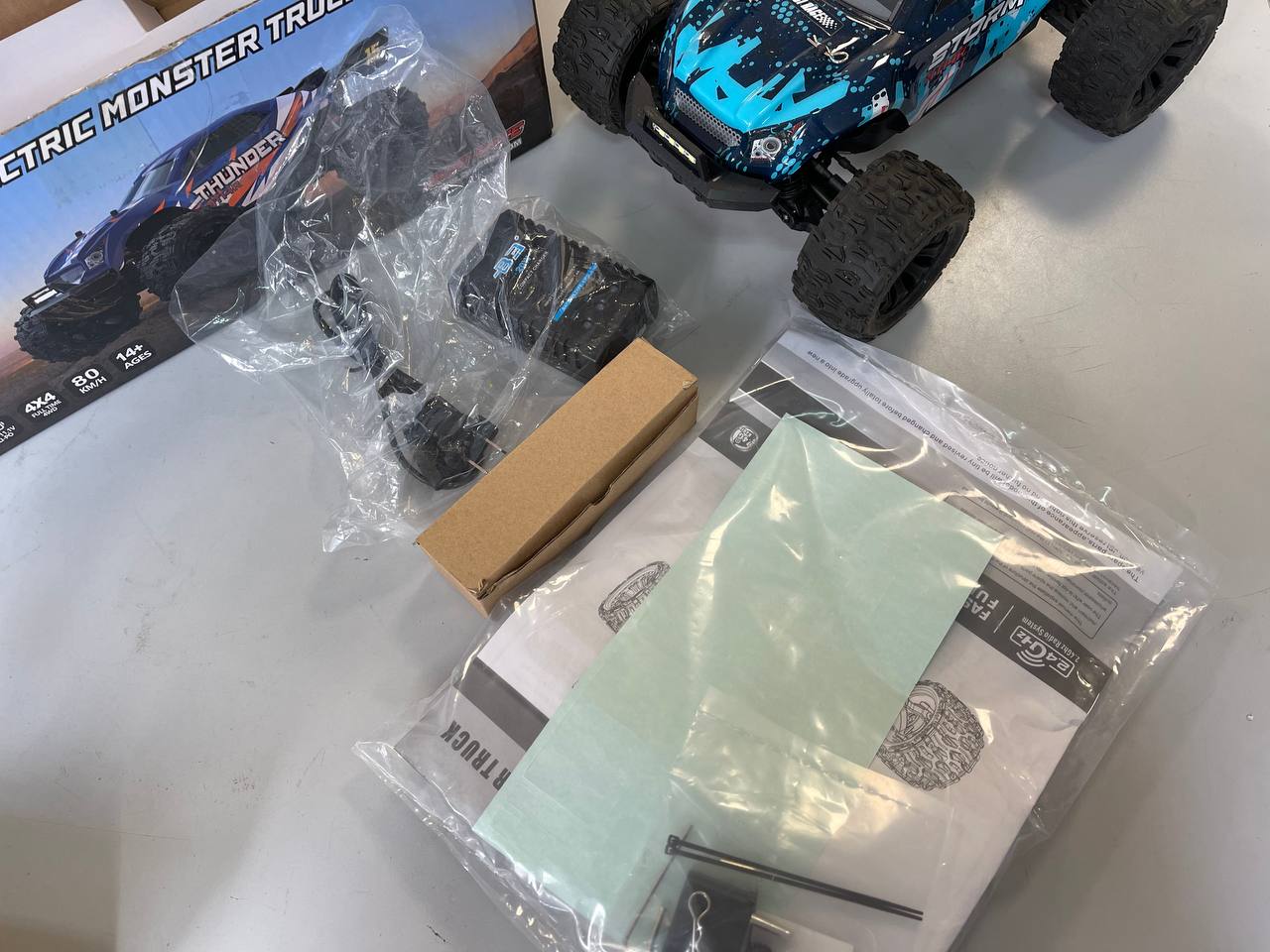 Радиоуправляемый автомобиль JIUSI PT14R MT14R 1/14 4WD (2 аккумулятора) (80 км/ч, бесколлекторные моторы) Б/У